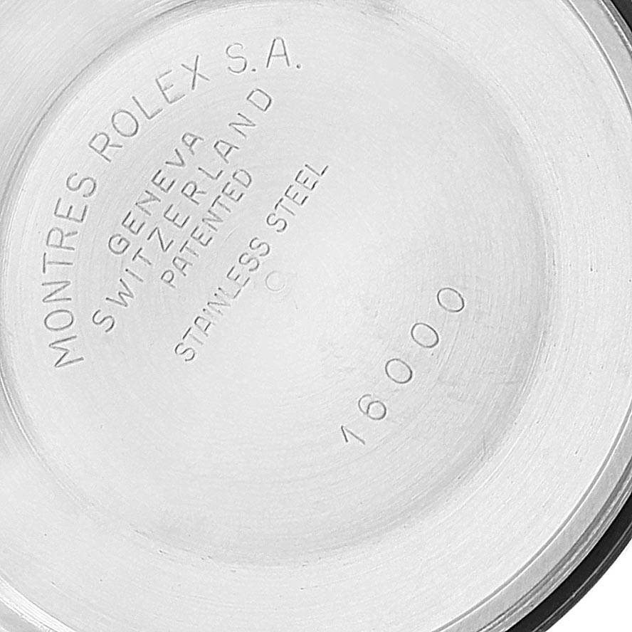 This is the case back of a Vintage Collection Rolex watch, showing the engraving details.