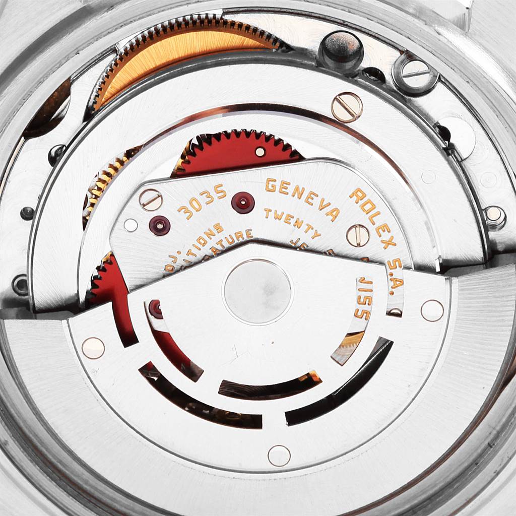 This image shows an up-close view of the inner mechanical movement of a Rolex Vintage Collection 16013 Men's Stainless Steel Champagne Dial 16013 Men's Stainless Steel Champagne Dial watch.
