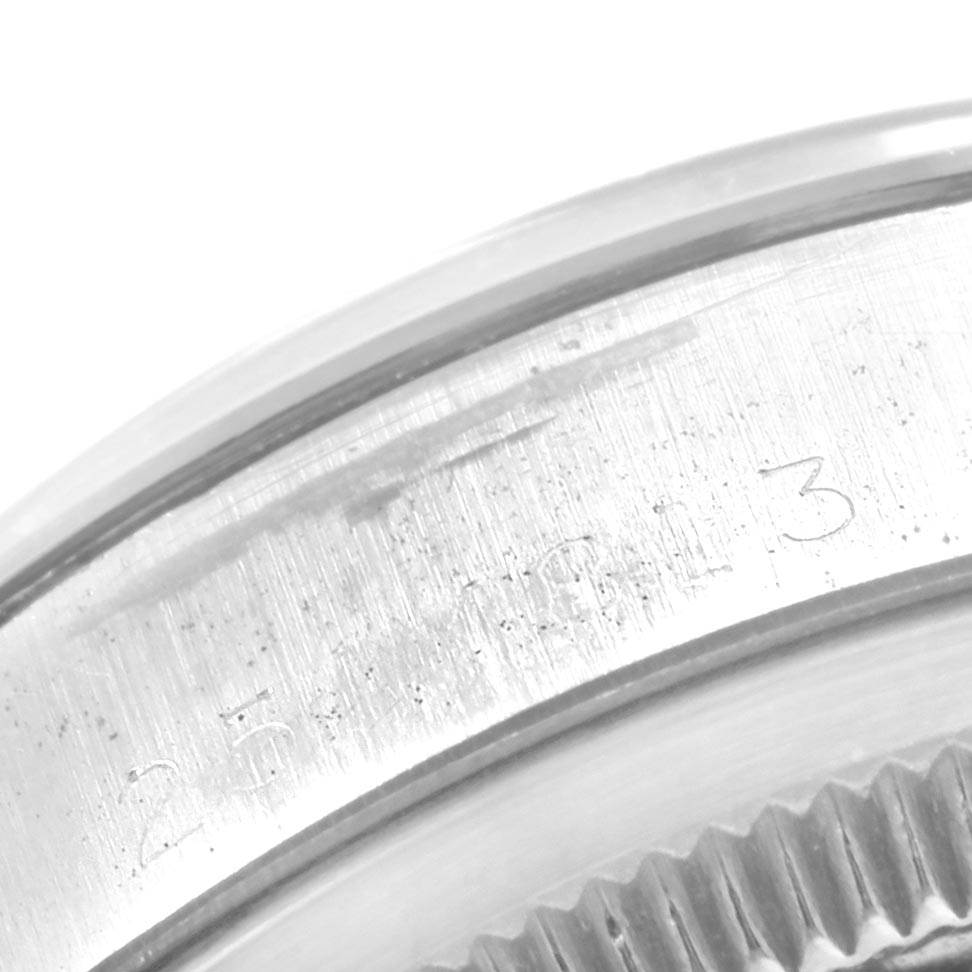This close-up image shows the side engraving and bezel of a Vintage Collection model by Rolex.