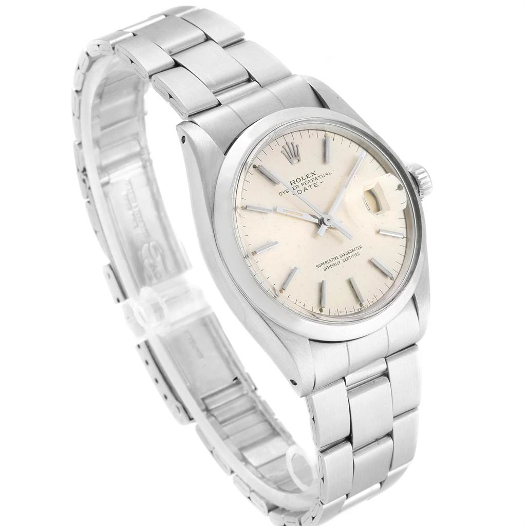 This image shows the Rolex Vintage Collection 1500 Men
s Stainless Steel Silver Dial 1500 Men
s Stainless Steel Silver Dial watch at a three-quarter angle, highlighting the face, bezel, bracelet, and crown.