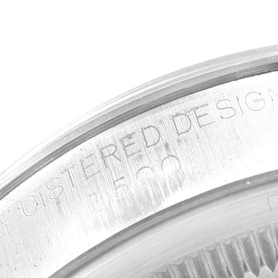 This image shows a close-up of the side with engraved text of the Rolex Vintage Collection 1500 Men
s Stainless Steel Silver Dial 1500 Men
s Stainless Steel Silver Dial model.