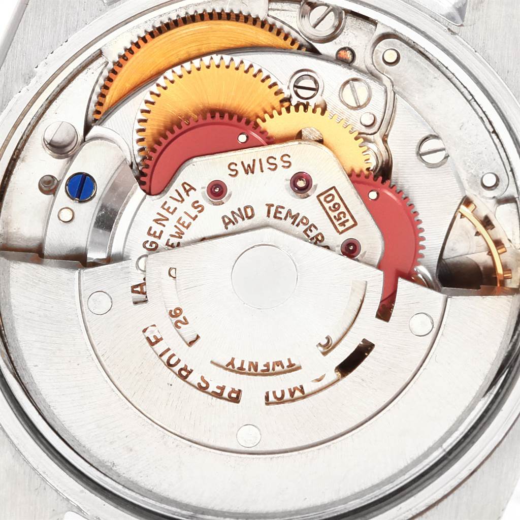 This image shows a detailed view of the inner mechanical movement of the Rolex Vintage Collection 1500 Men
s Stainless Steel Silver Dial 1500 Men
s Stainless Steel Silver Dial model watch, focusing on the gears and jewels.