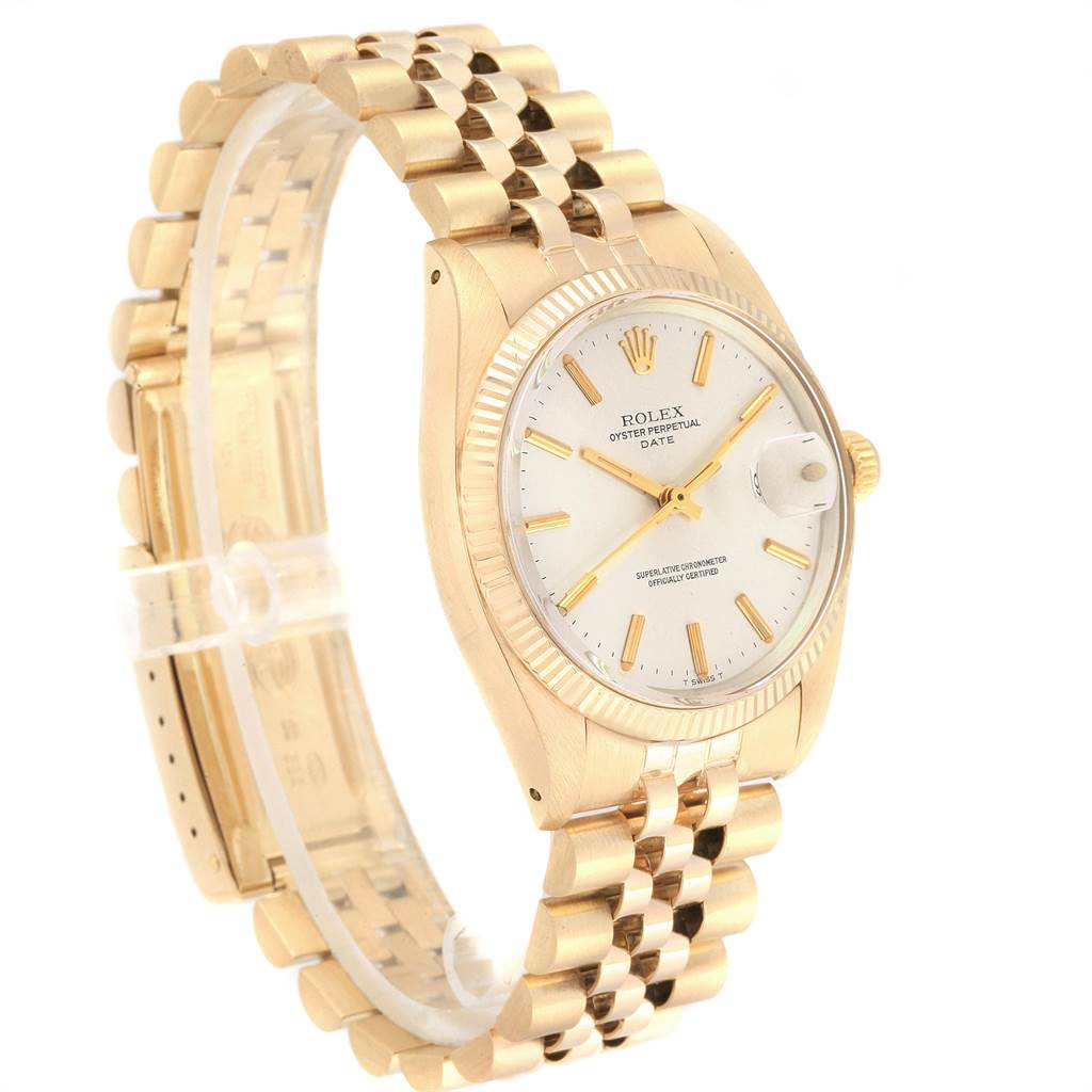 The image shows a side angle of the Rolex Vintage Collection 1503 Men
s Yellow Gold Silver Dial 1503 Men
s Yellow Gold Silver Dial model, displaying its dial, bezel, crown, and bracelet.