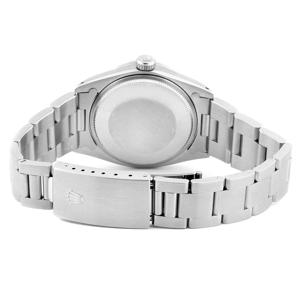 This image shows the back view of a Vintage Collection Rolex watch, focusing on the case back, crown, and bracelet with the clasp.