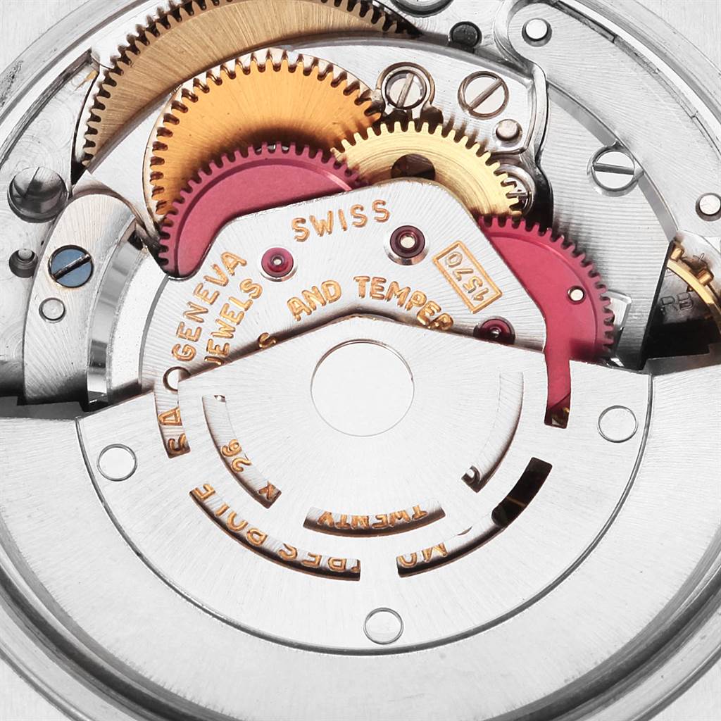 This close-up shows the intricate gears and inner mechanism of the Rolex Vintage Collection 1501 Men
s Stainless Steel Silver Dial 1501 Men
s Stainless Steel Silver Dial watch.