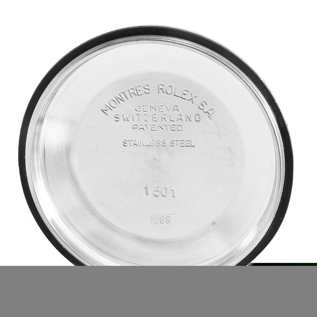 This image shows the inside case back of a Vintage Collection Rolex watch.