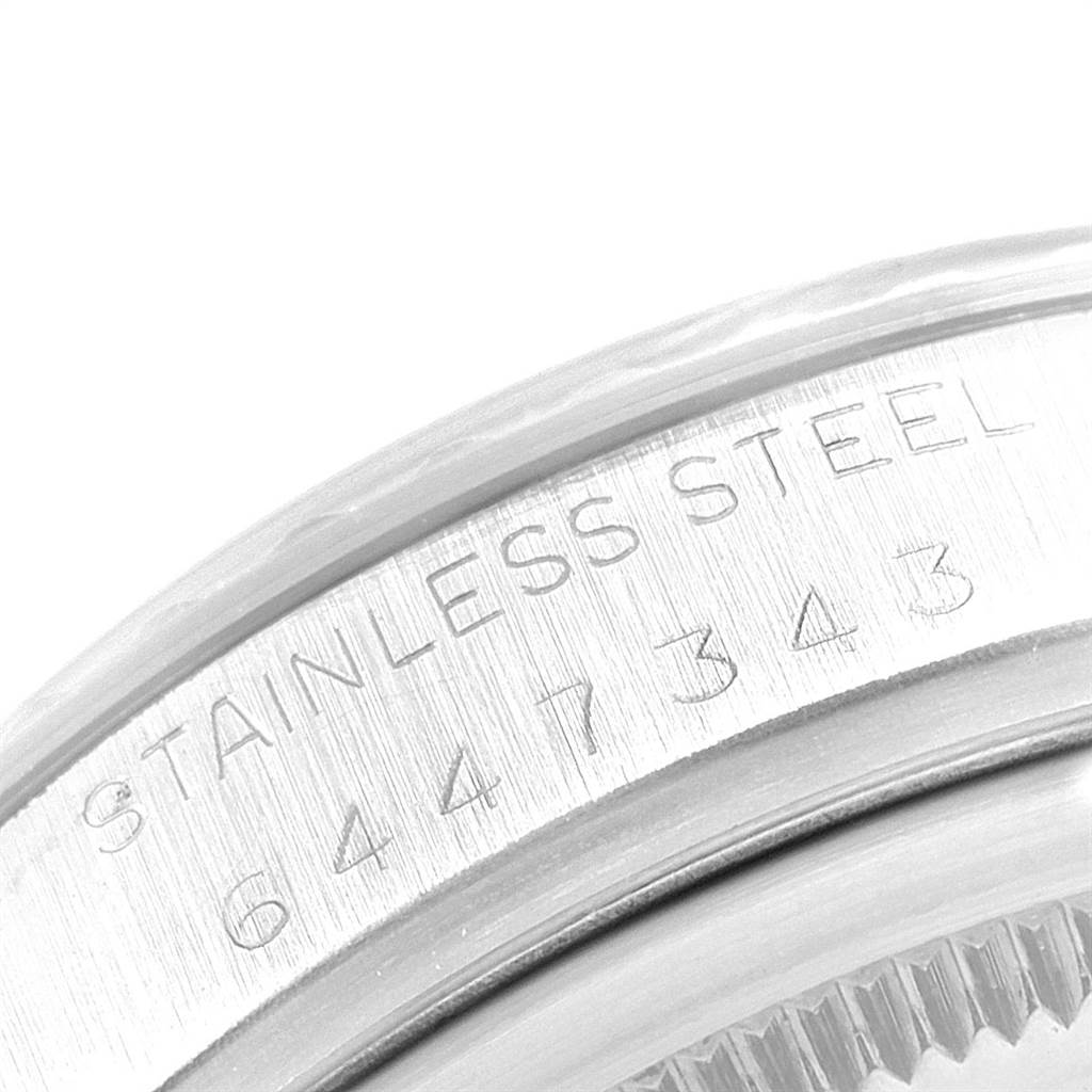 The image shows a close-up of the stainless steel case back with the engraved serial number of the Rolex Vintage Collection 16030 Men's Stainless Steel Silver Dial 16030 Men's Stainless Steel Silver Dial watch.