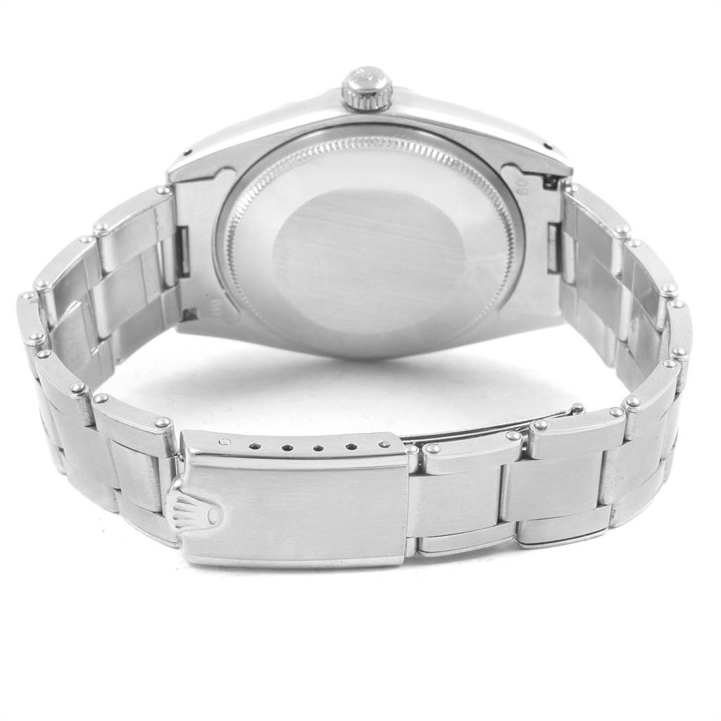 This image shows the rear view of the Vintage Collection model by Rolex, highlighting the case back and bracelet clasp.