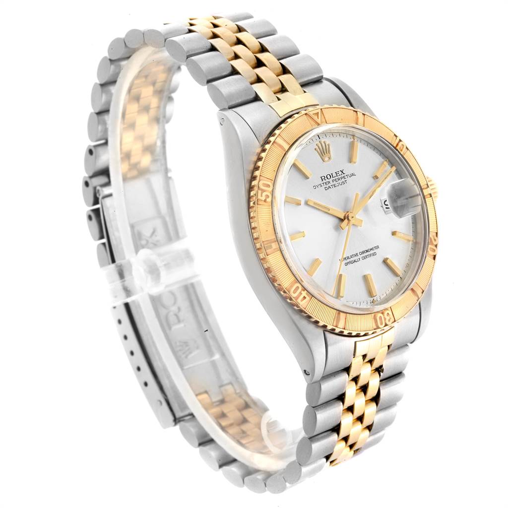 The image shows a side angle of a Rolex Vintage Collection 1625 Men
s Steel and Gold (two tone) Silver Dial 1625 Men
s Steel and Gold (two tone) Silver Dial watch, highlighting the gold and silver bracelet, bezel, and white dial.