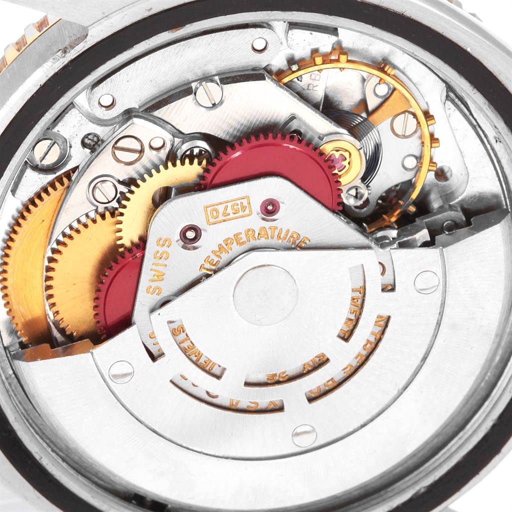 This image shows the intricate internal mechanisms and gears of the Rolex Vintage Collection 1625 Men
s Steel and Gold (two tone) Silver Dial 1625 Men
s Steel and Gold (two tone) Silver Dial watch from a top-down angle.