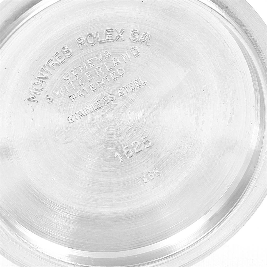 The image shows the interior of the case back of a Rolex Vintage Collection 1625 Men
s Steel and Gold (two tone) Silver Dial 1625 Men
s Steel and Gold (two tone) Silver Dial model 1625, emphasizing the engraved details.