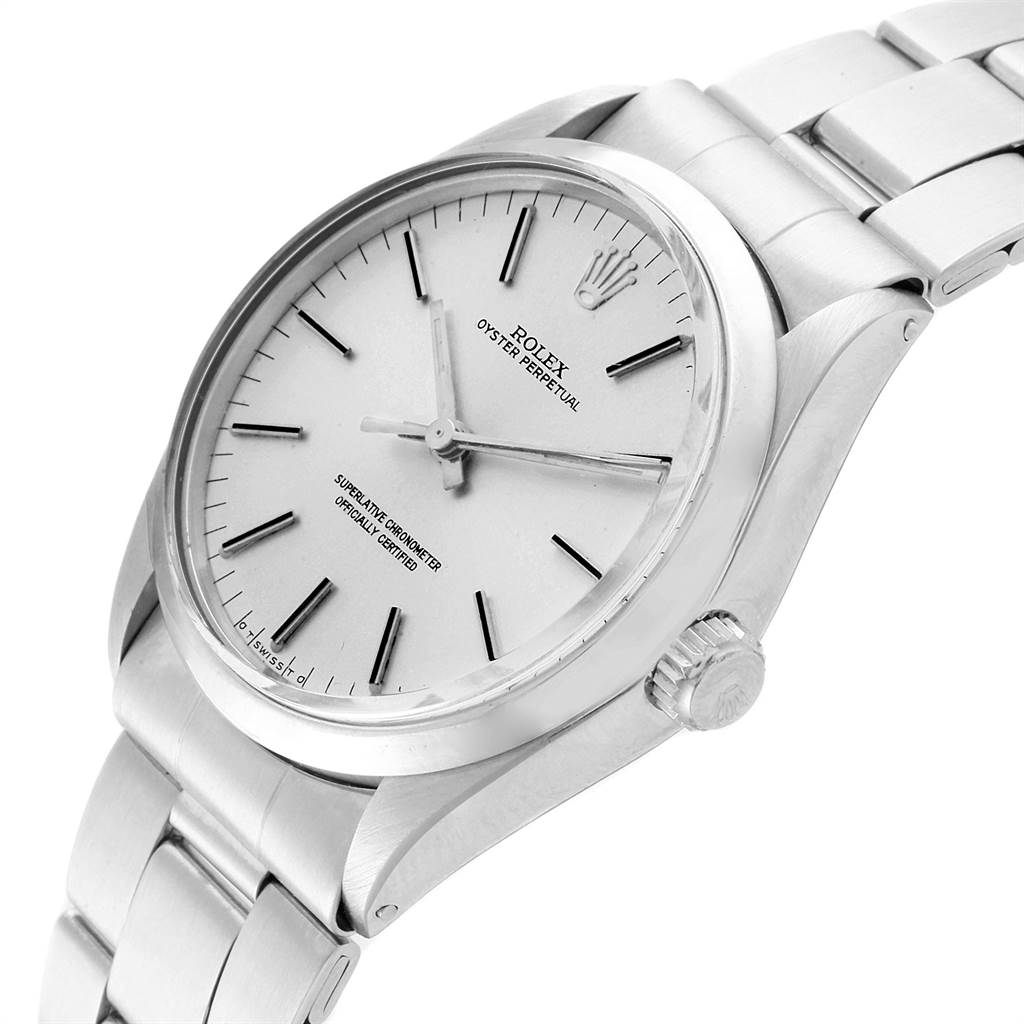 The image shows a Rolex Vintage Collection 1002 Men
s Stainless Steel Silver Dial 1002 Men
s Stainless Steel Silver Dial Oyster Perpetual watch, viewed from a front-side angle showcasing its dial and bracelet.
