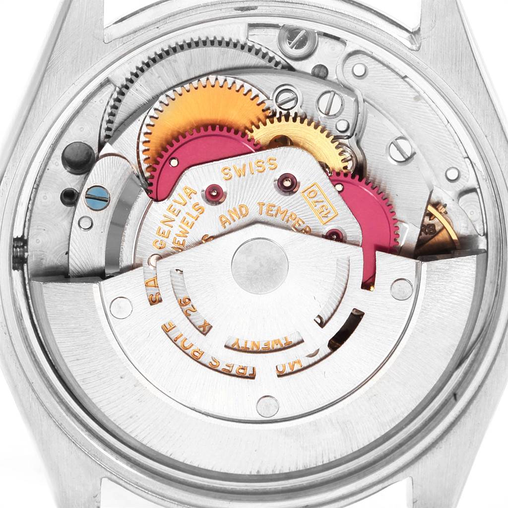 The image shows the intricate internal mechanism of a Rolex Vintage Collection 1002 Men
s Stainless Steel Silver Dial 1002 Men
s Stainless Steel Silver Dial model, viewed from the back.