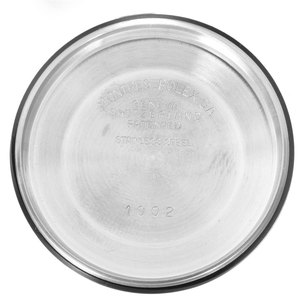 This image shows the case back of a Rolex Vintage Collection 1002 Men
s Stainless Steel Silver Dial 1002 Men
s Stainless Steel Silver Dial watch, displaying the branding and model number.