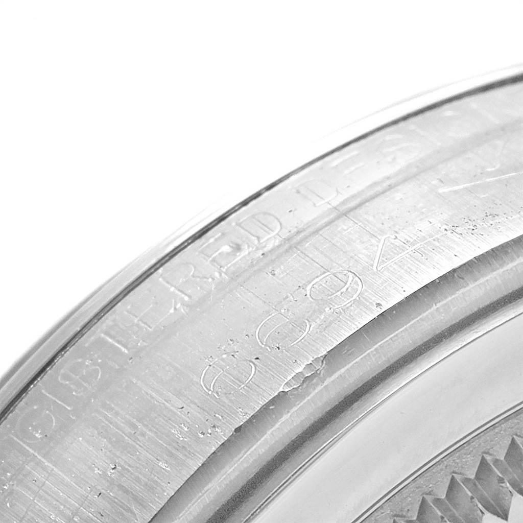 This image shows a close-up of the engraved bezel of the Rolex Vintage Collection 6694 Men
s Stainless Steel Silver Dial 6694 Men
s Stainless Steel Silver Dial watch.