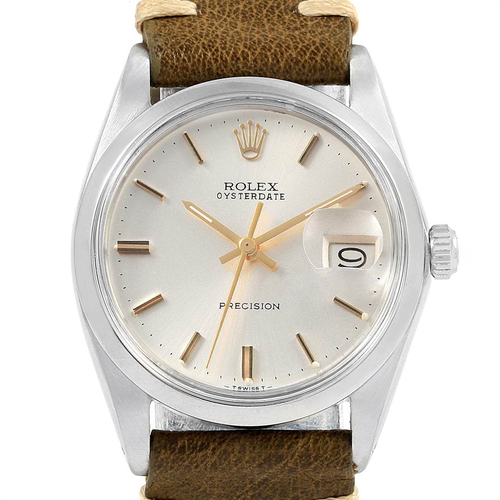 This image shows a front view of a Rolex Vintage Collection 6694 Men
s Stainless Steel Silver Dial 6694 Men
s Stainless Steel Silver Dial Oysterdate watch with a brown leather strap and date display.