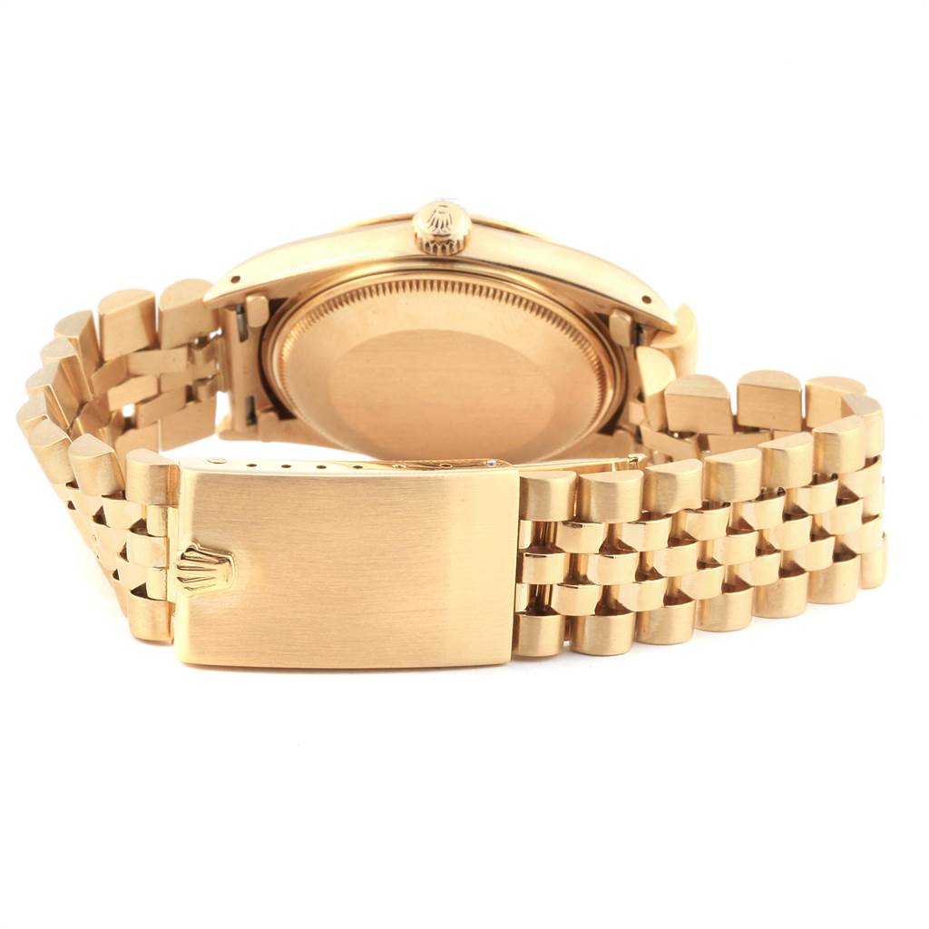 This image shows the back view of the Rolex Vintage Collection 15038 Men
s Yellow Gold Champagne Dial 15038 Men
s Yellow Gold Champagne Dial watch, with a focus on the case back and metal bracelet.