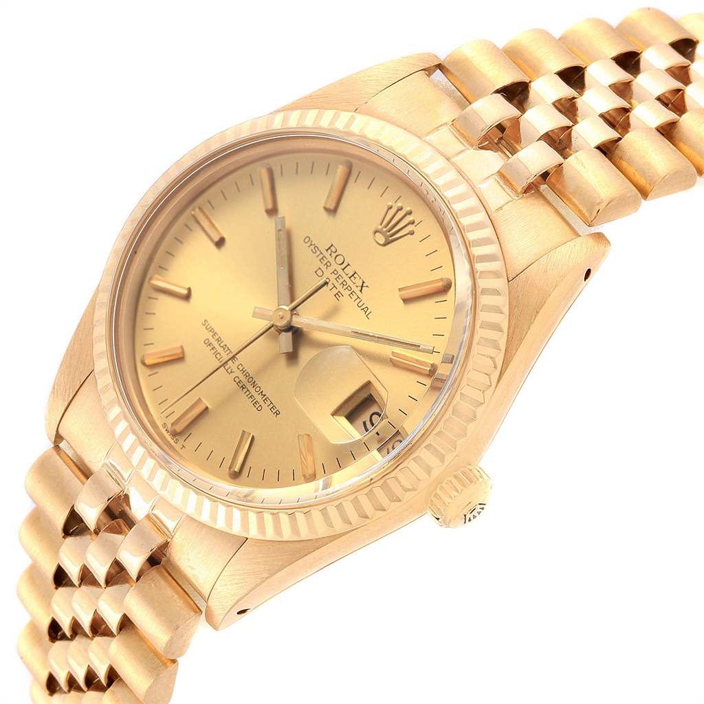 The image shows a Rolex Vintage Collection 15038 Men
s Yellow Gold Champagne Dial 15038 Men
s Yellow Gold Champagne Dial watch at a front-side angle, highlighting the dial, bezel, crown, and bracelet.