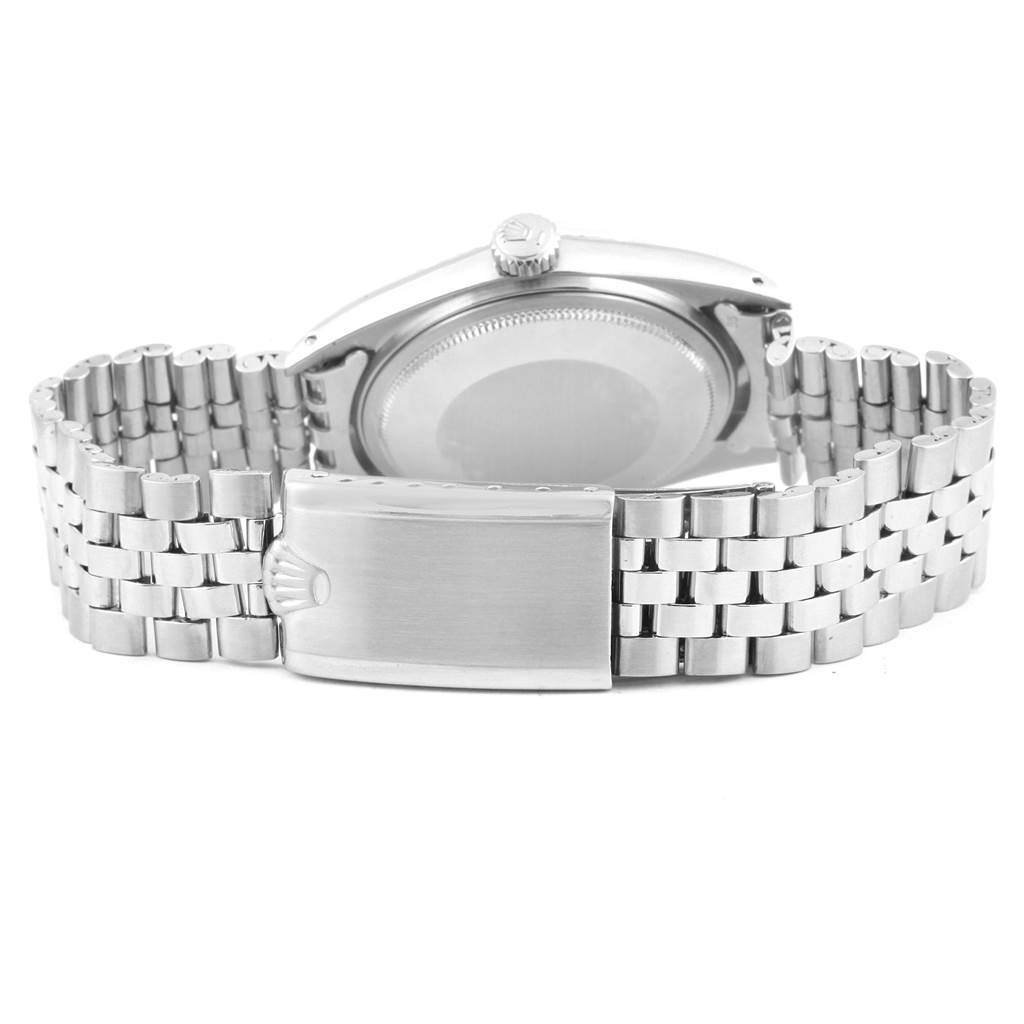 The image shows the back view of the Rolex Vintage Collection 1601 Men's Stainless Steel Green Dial 1601 Men's Stainless Steel Green Dial watch, highlighting the case back and the Jubilee bracelet.