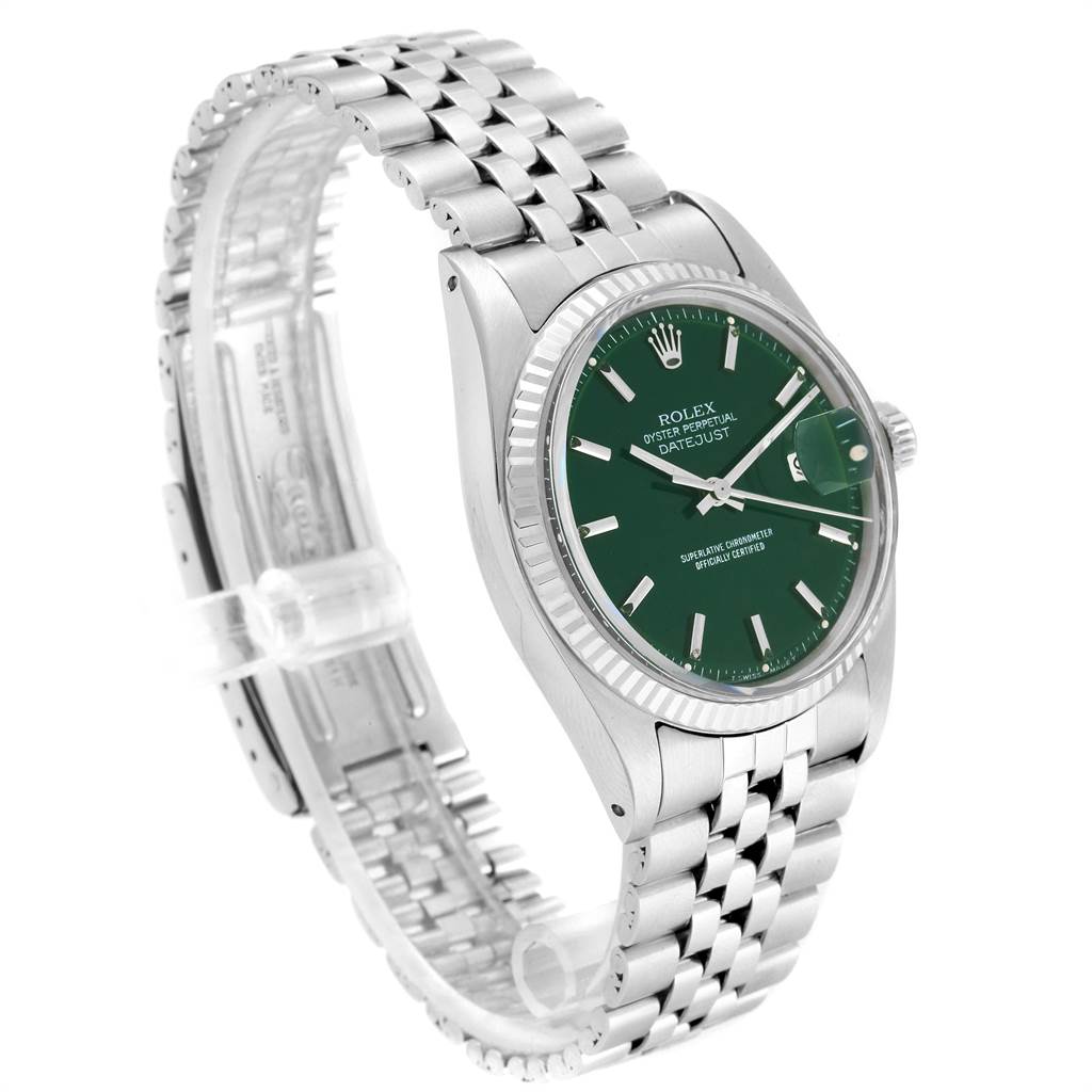 The image shows a Rolex Vintage Collection 1601 Men's Stainless Steel Green Dial 1601 Men's Stainless Steel Green Dial watch in a three-quarter angle, highlighting the green dial, fluted bezel, and Jubilee bracelet.