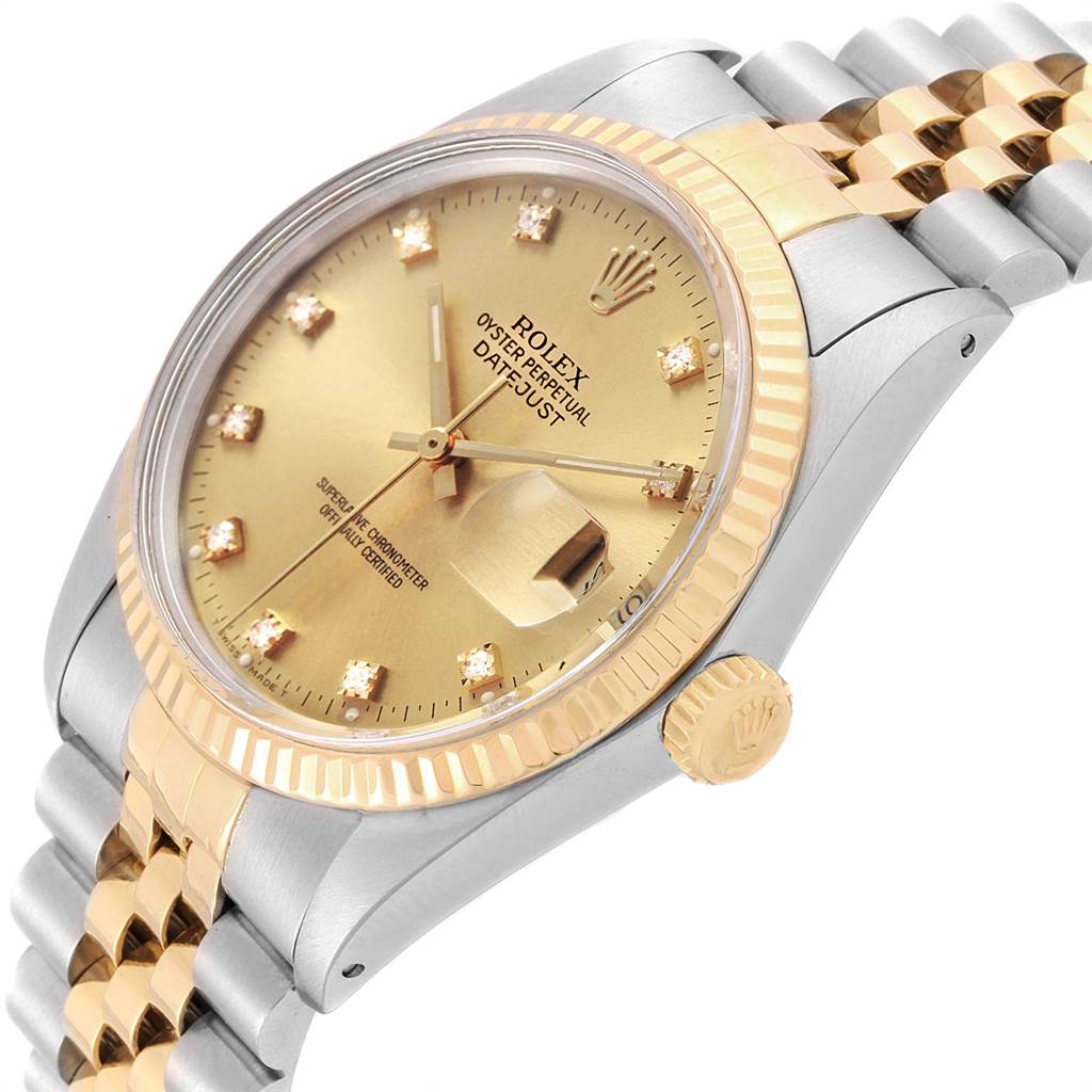 This image shows a close-up angle of a Rolex Vintage Collection 16013 Men's Stainless Steel Champagne Dial 16013 Men's Stainless Steel Champagne Dial Datejust watch, featuring the dial, crown, and part of the bracelet.