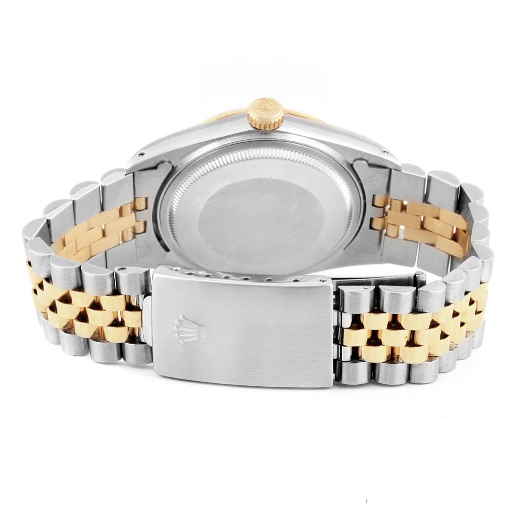 The image shows the back case and bracelet of a Rolex Vintage Collection 16013 Men's Stainless Steel Champagne Dial 16013 Men's Stainless Steel Champagne Dial watch, featuring a two-tone metal design.