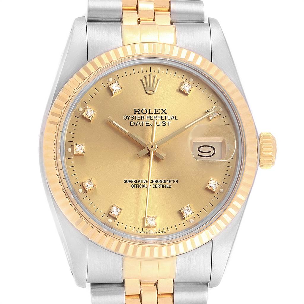 This image shows a frontal view of a Rolex Vintage Collection 16013 Men's Stainless Steel Champagne Dial 16013 Men's Stainless Steel Champagne Dial Datejust watch, highlighting its dial, bezel, and bracelet.