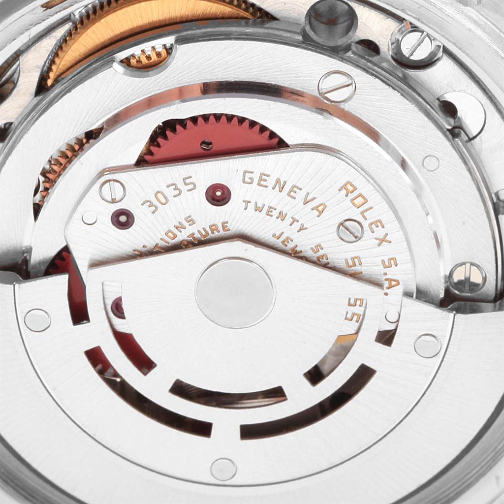 The image shows a close-up view of the inner automatic movement mechanism of a Rolex Vintage Collection 16013 Men's Stainless Steel Champagne Dial 16013 Men's Stainless Steel Champagne Dial model watch.