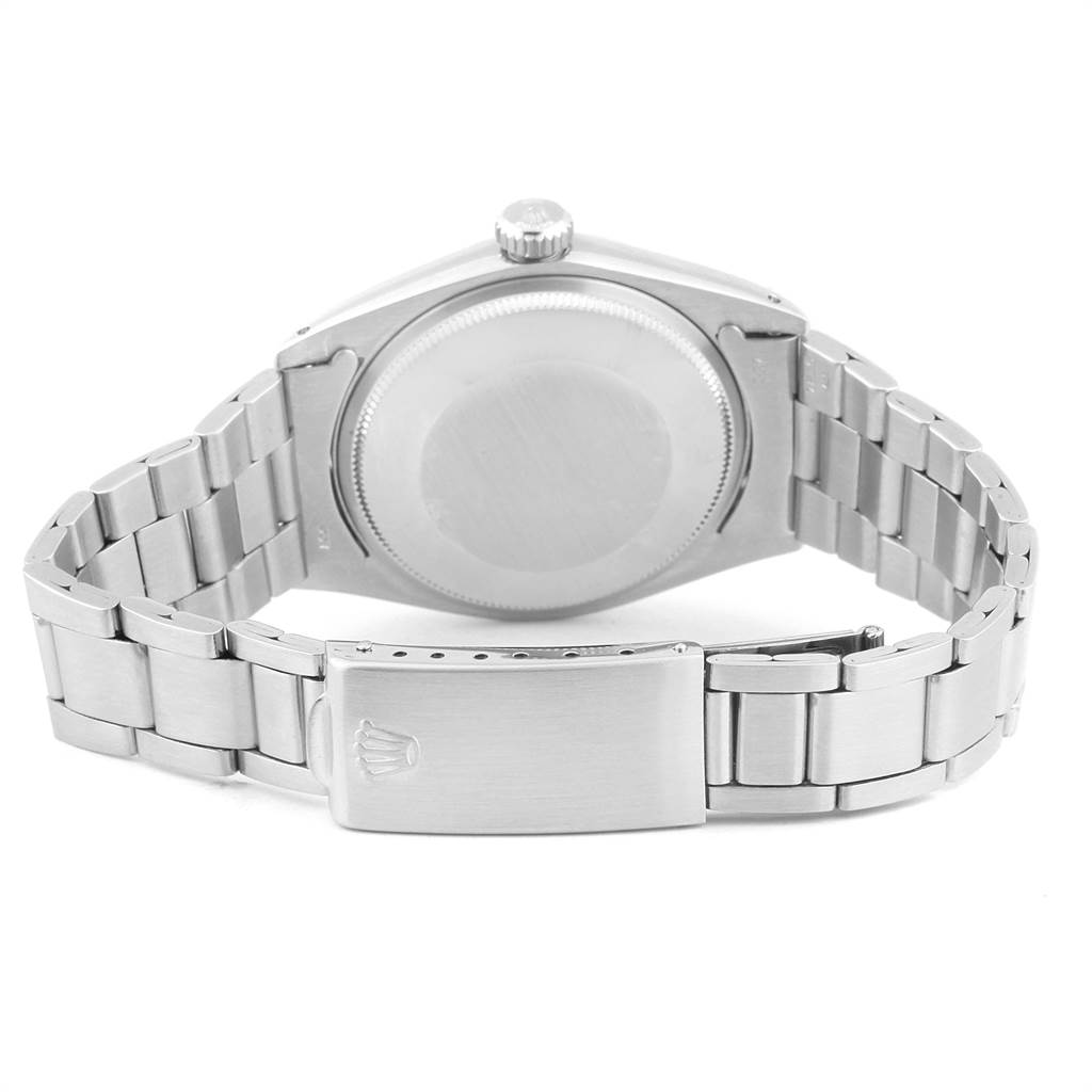 This image shows the back view of the Rolex Vintage Collection 1500 Men
s Stainless Steel Silver Dial 1500 Men
s Stainless Steel Silver Dial watch, highlighting the case back and bracelet.