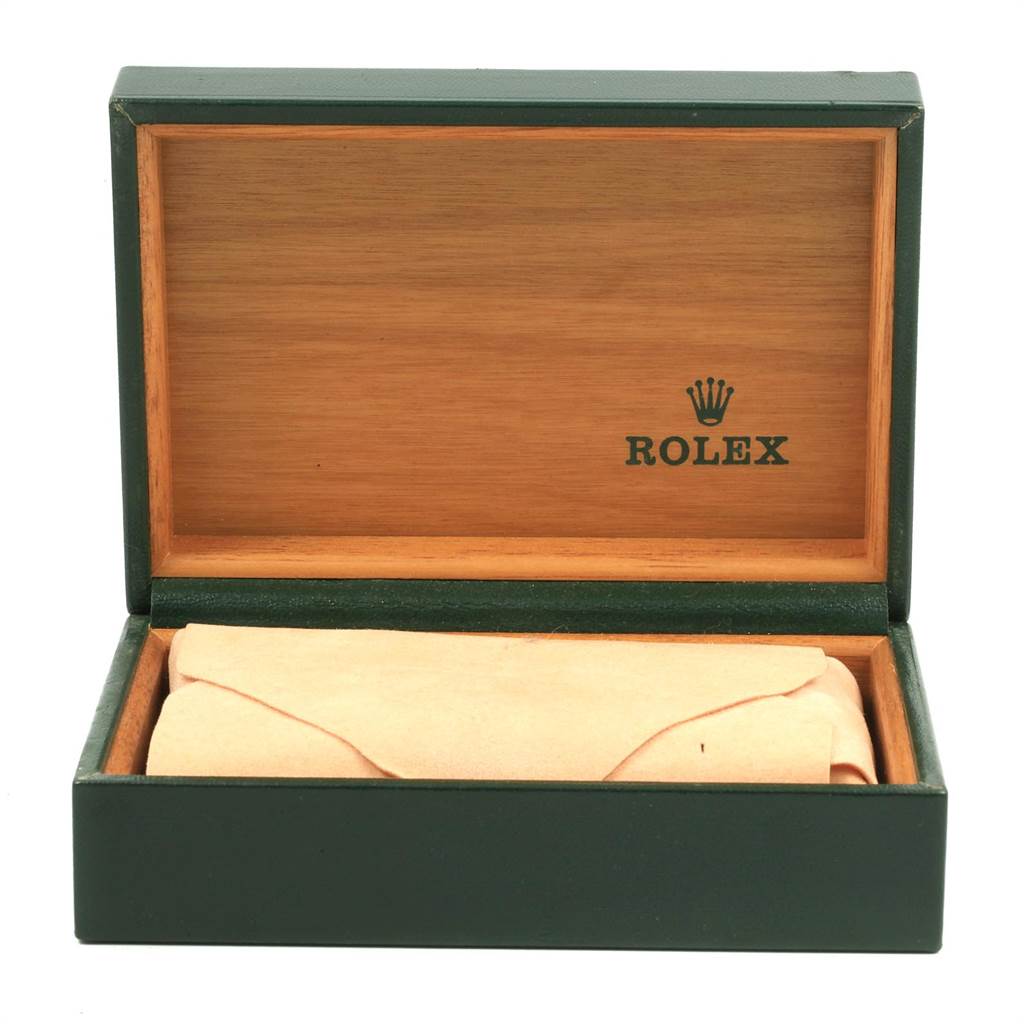 The image shows an open Rolex Vintage Collection 1003 Men's Stainless Steel Silver Dial 1003 Men's Stainless Steel Silver Dial watch box displaying its interior.