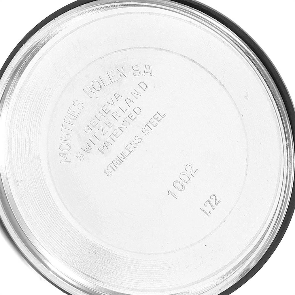 This image shows the inner case back of a Rolex Vintage Collection 1003 Men's Stainless Steel Silver Dial 1003 Men's Stainless Steel Silver Dial watch from a top-down angle.