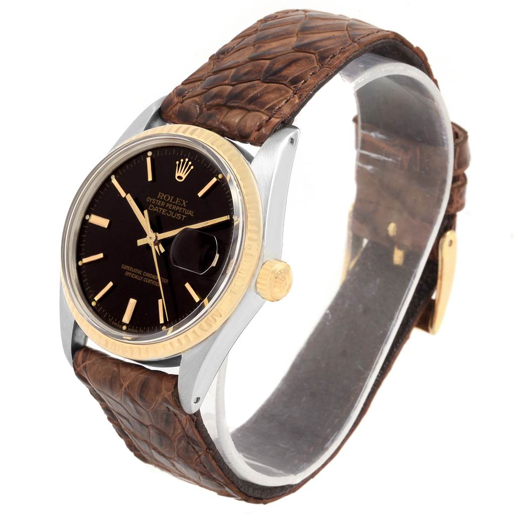 The image shows a Vintage Collection Rolex watch at a three-quarter angle, highlighting its dial, bezel, crown, and leather strap.