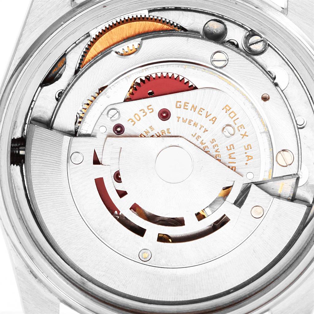 The image shows the internal mechanism of a Rolex Vintage Collection 16013 Men
s Stainless Steel Black Dial 16013 Men
s Stainless Steel Black Dial watch, model 3035, with gears and movement parts visible.