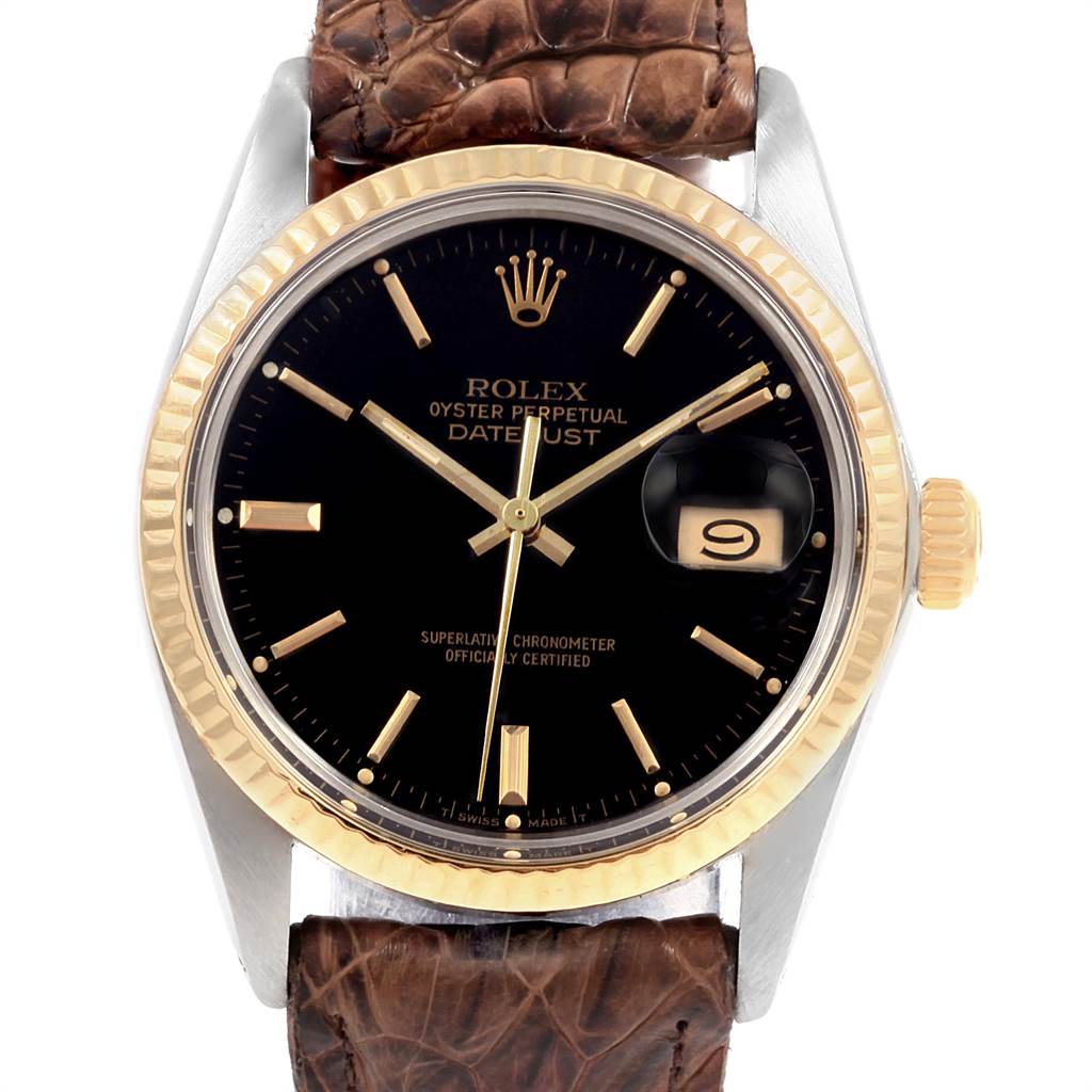 The image shows a front view of the Rolex Vintage Collection 16013 Men
s Stainless Steel Black Dial 16013 Men
s Stainless Steel Black Dial Oyster Perpetual Datejust watch, highlighting the dial, bezel, and leather strap.