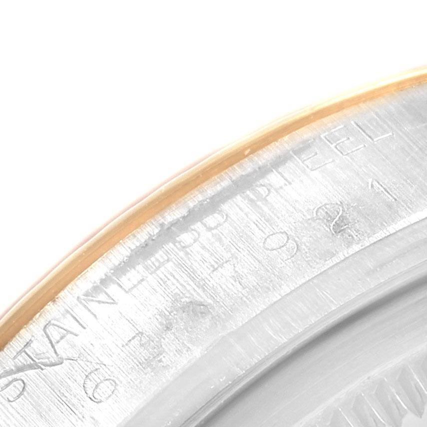 This image shows a close-up of the side and edge of the caseback of the Rolex Vintage Collection 16013 Men
s Stainless Steel Black Dial 16013 Men
s Stainless Steel Black Dial watch with engraving details visible.