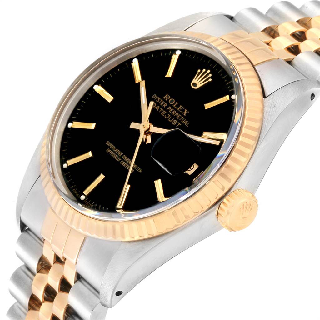 The Rolex Vintage Collection 16013 Men's Stainless Steel Black Dial 16013 Men's Stainless Steel Black Dial watch is shown at an angled close-up, highlighting the black dial, gold hour markers, and fluted bezel.