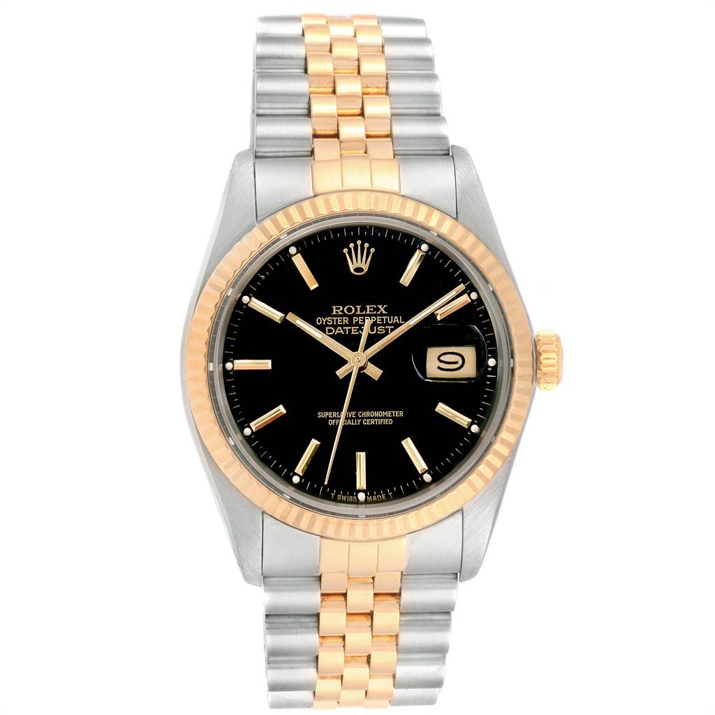 This image shows a front view of a Rolex Vintage Collection 16013 Men's Stainless Steel Black Dial 16013 Men's Stainless Steel Black Dial Oyster Perpetual Datejust watch, highlighting its gold and silver parts.