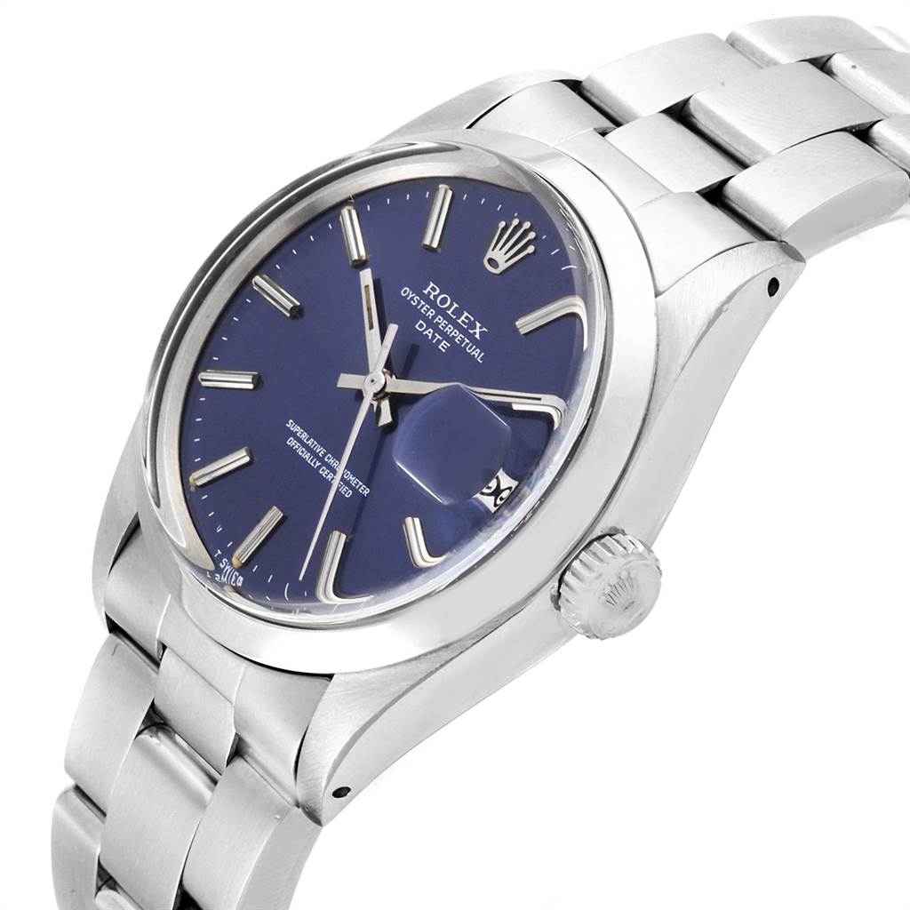 The image shows a Rolex Vintage Collection 1500 Men's Stainless Steel Blue Dial 1500 Men's Stainless Steel Blue Dial Oyster Perpetual Date watch at a three-quarter angle, featuring its blue dial and metal bracelet.