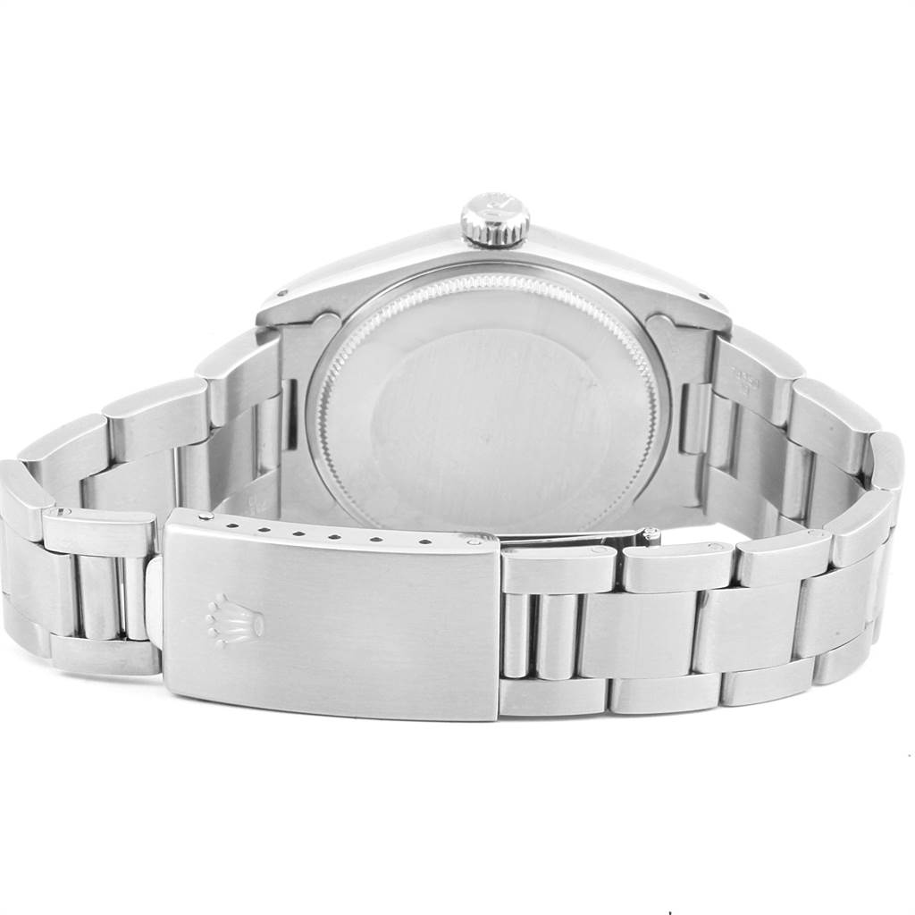 This image shows the back view of the Rolex Vintage Collection 1500 Men's Stainless Steel Blue Dial 1500 Men's Stainless Steel Blue Dial watch, focusing on the case back, crown, and bracelet.