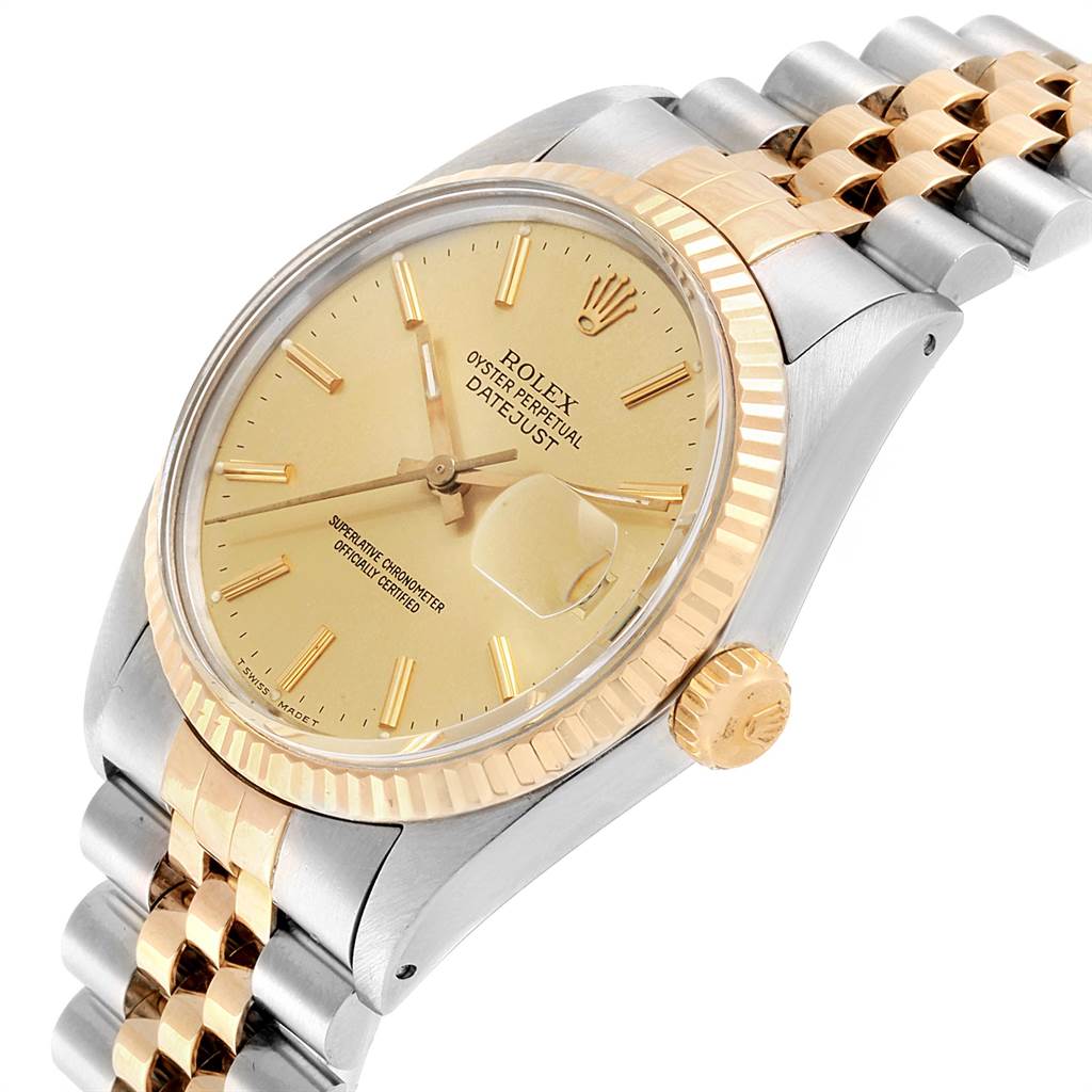 The image shows a close-up of the Rolex Vintage Collection 16013 Men's Stainless Steel Champagne Dial 16013 Men's Stainless Steel Champagne Dial Oyster Perpetual Datejust, displaying its face, crown, and part of the bracelet.