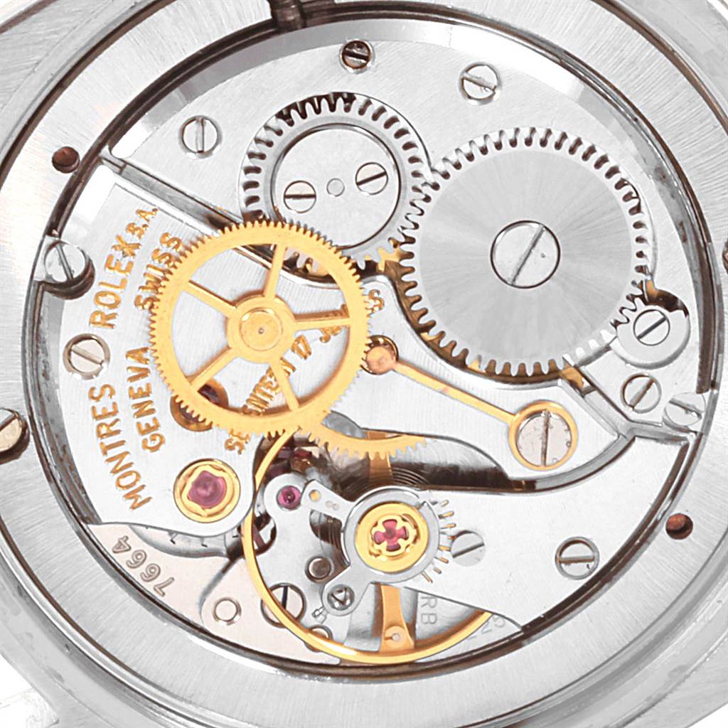 This image shows the intricate internal mechanics of a Rolex Vintage Collection 6694 Men's Stainless Steel Brown Dial 6694 Men's Stainless Steel Brown Dial watch from a close-up, top-down angle.