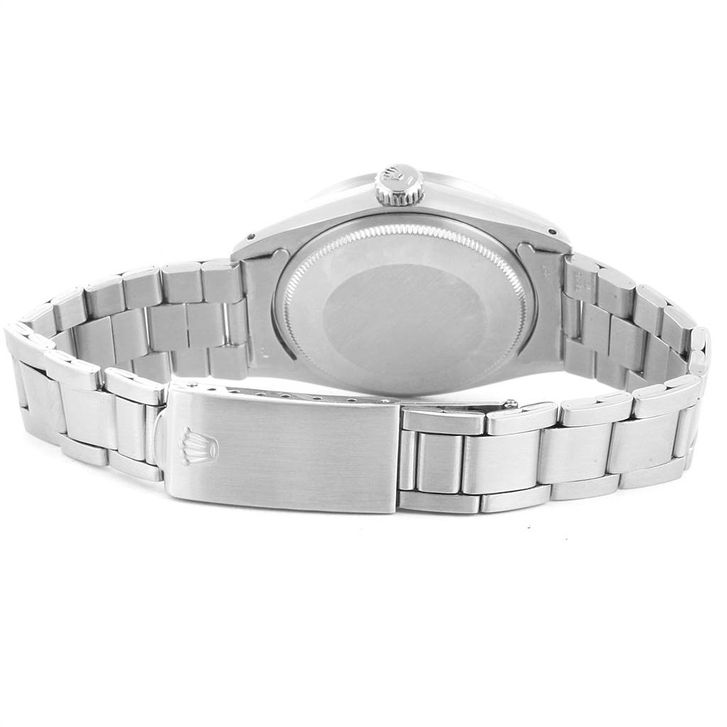 The image shows the back view of a Rolex Vintage Collection 1501 Men's Stainless Steel Silver Dial 1501 Men's Stainless Steel Silver Dial watch, highlighting the clasp and bracelet links.