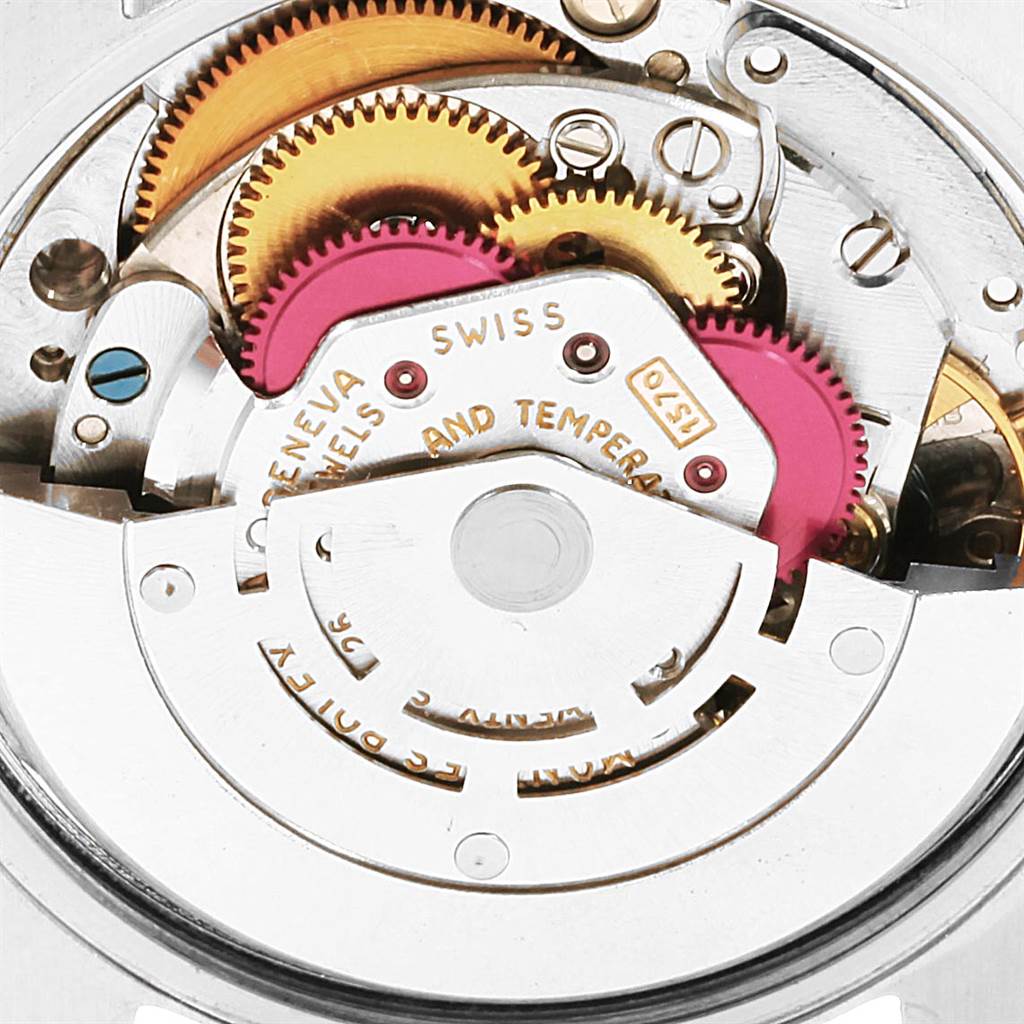 The image shows the intricate internal mechanism and gears of a Rolex Vintage Collection 1501 Men's Stainless Steel Silver Dial 1501 Men's Stainless Steel Silver Dial watch.