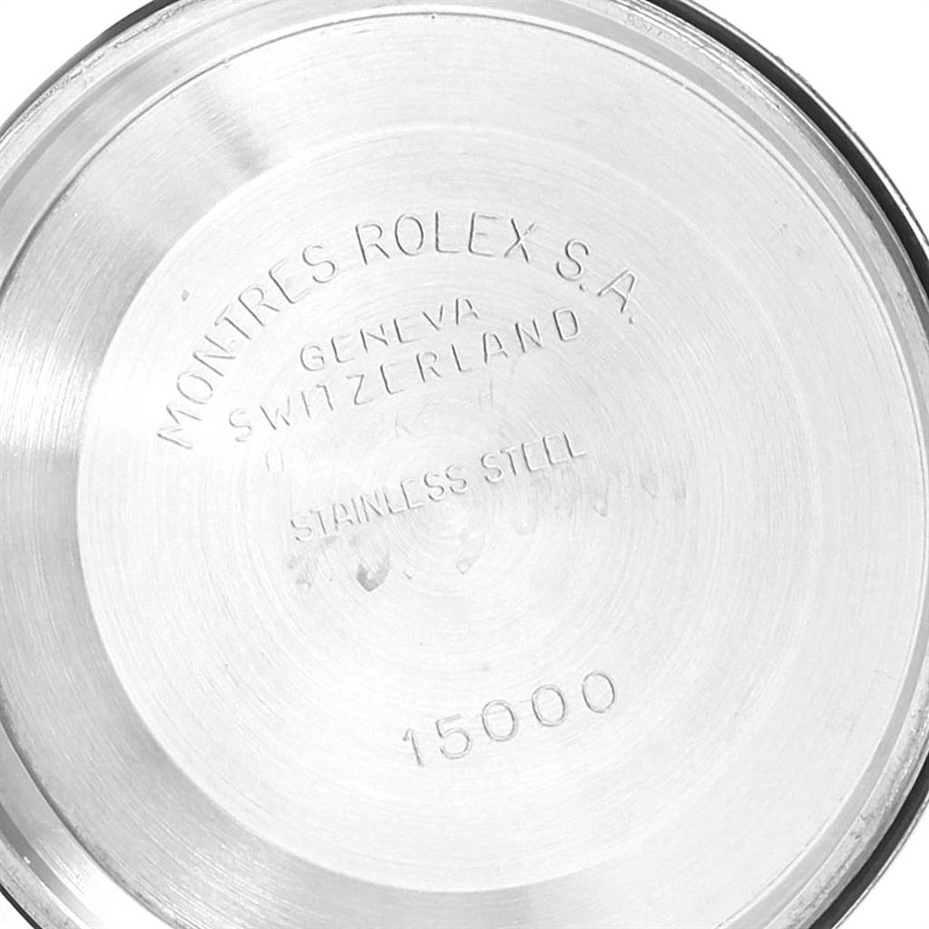 The image shows the stainless steel case back of the Vintage Collection model by Rolex.