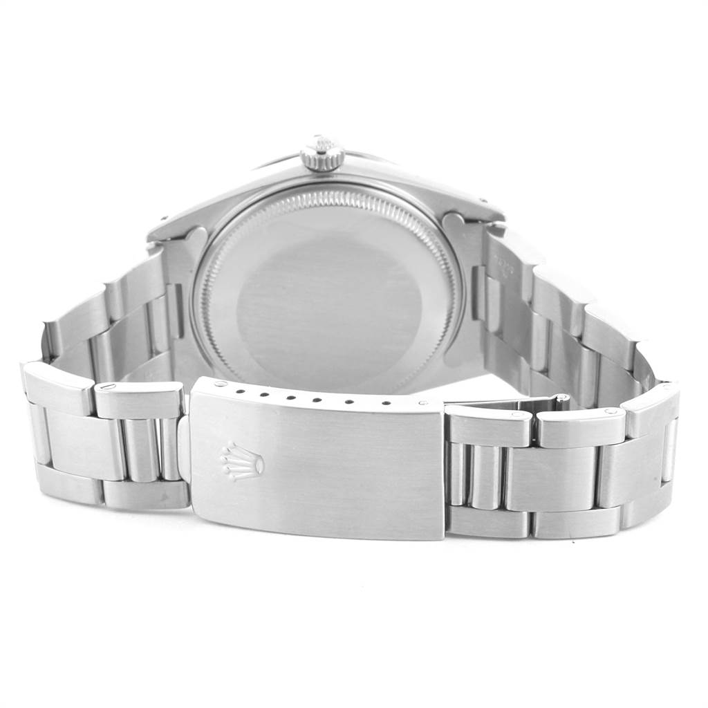 The image shows the back view of the Rolex Vintage Collection 15000 Men's Stainless Steel Silver Dial 15000 Men's Stainless Steel Silver Dial model, featuring its clasp and bracelet.