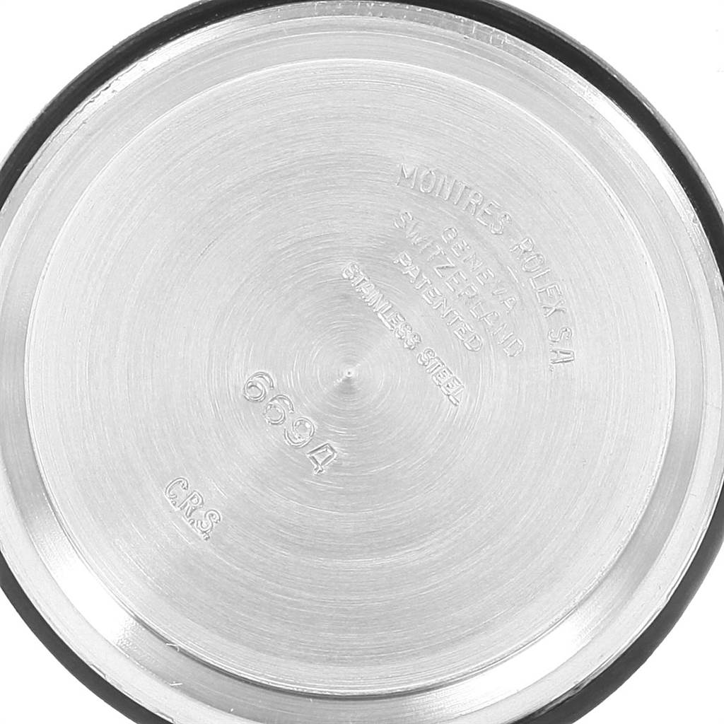 This image shows the back case cover of the Vintage Collection model by Rolex, displaying engraved details.