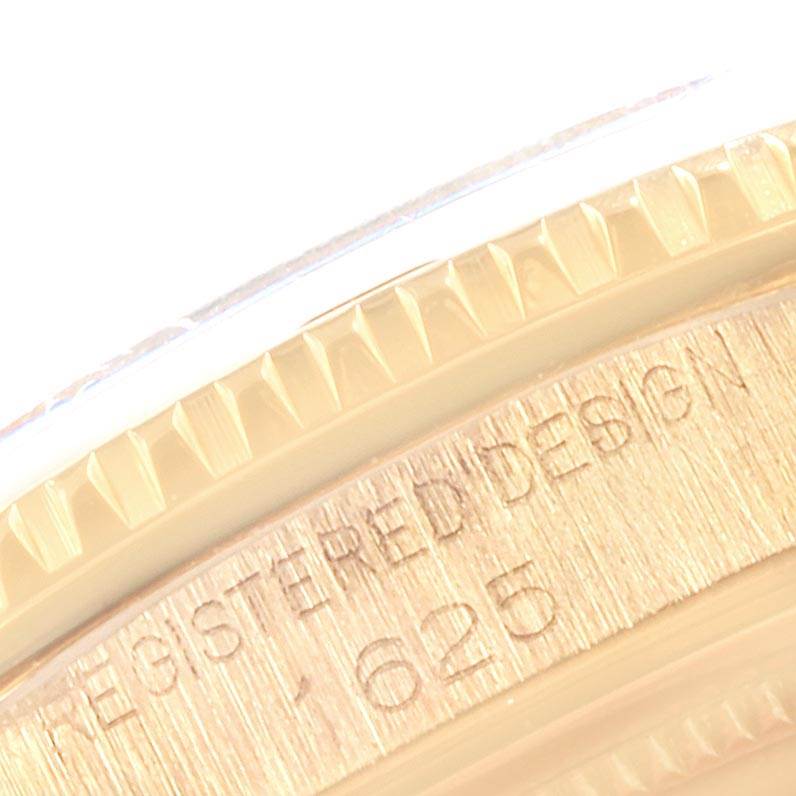 This image shows a close-up of the bezel and case side of the Vintage Collection watch by Rolex.