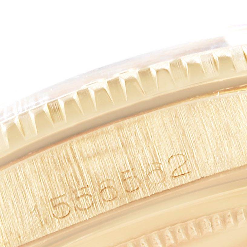 This close-up image of the Vintage Collection by Rolex shows the engraved side of the watch bezel and case.