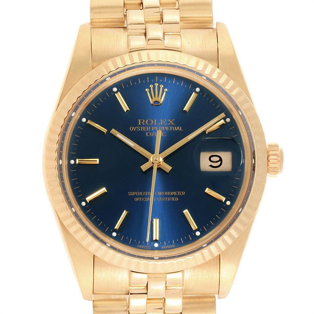 The image shows a front view of the Rolex Vintage Collection 15037 Men
s Yellow Gold Blue Dial 15037 Men
s Yellow Gold Blue Dial Oyster Perpetual Date watch, highlighting its blue dial and gold bracelet.