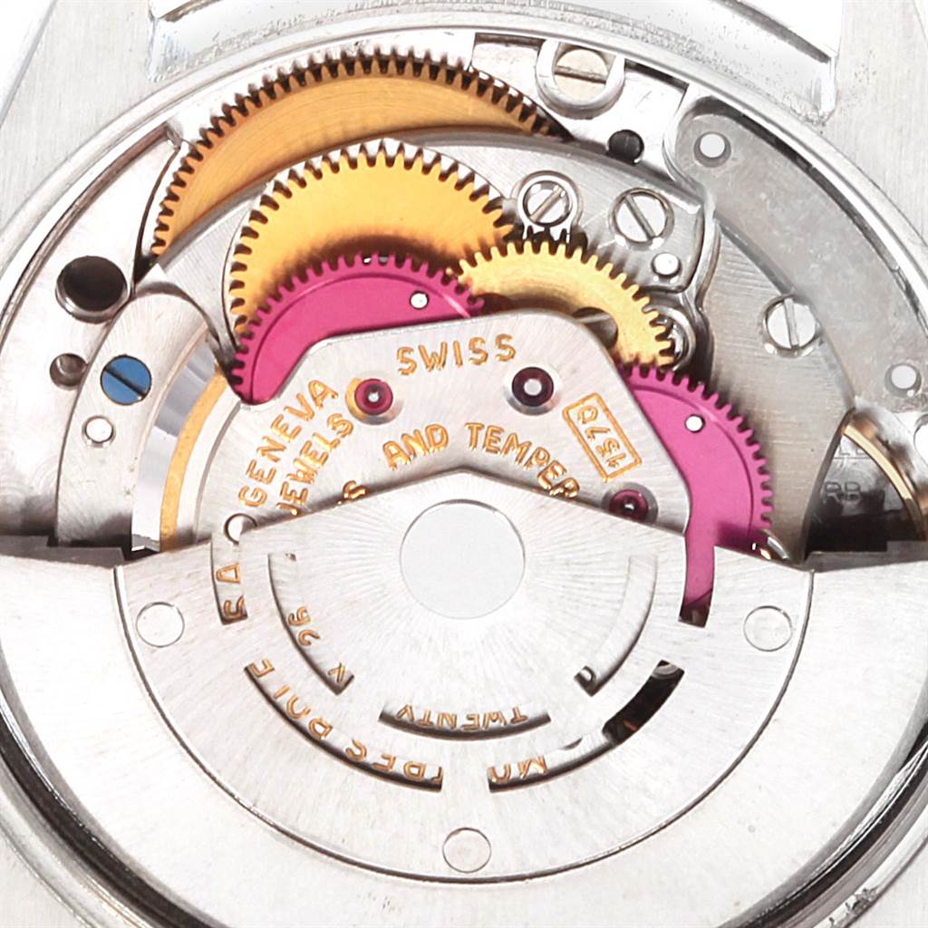 The image shows the internal mechanical parts and gears of a Rolex Vintage Collection 1002 Men's Stainless Steel Grey Dial 1002 Men's Stainless Steel Grey Dial watch from an overhead angle.